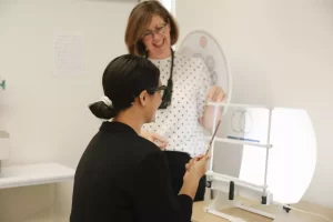 Optometrist with a patient